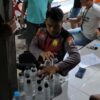 Samapta Polres Situbondo Tertibkan Peredaran Miras di Banyuputih, Sita Puluhan Botol Arak